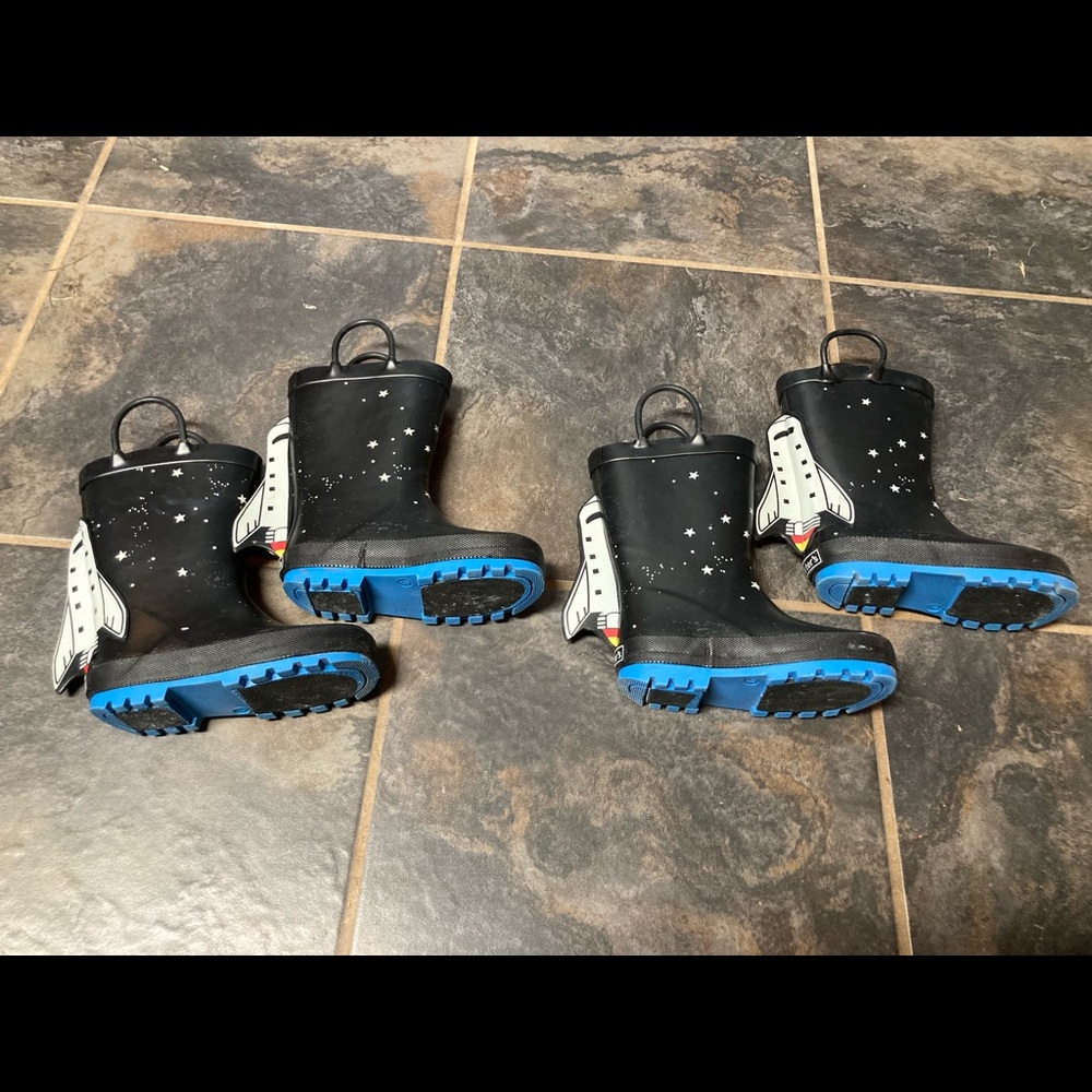 Gently used Carter’s rocket ship/space rain boots - Size 11/12.